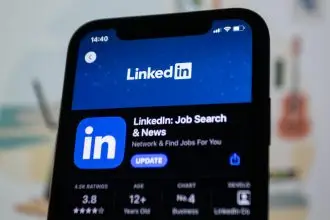 close up of a smartphone displaying linkedin application